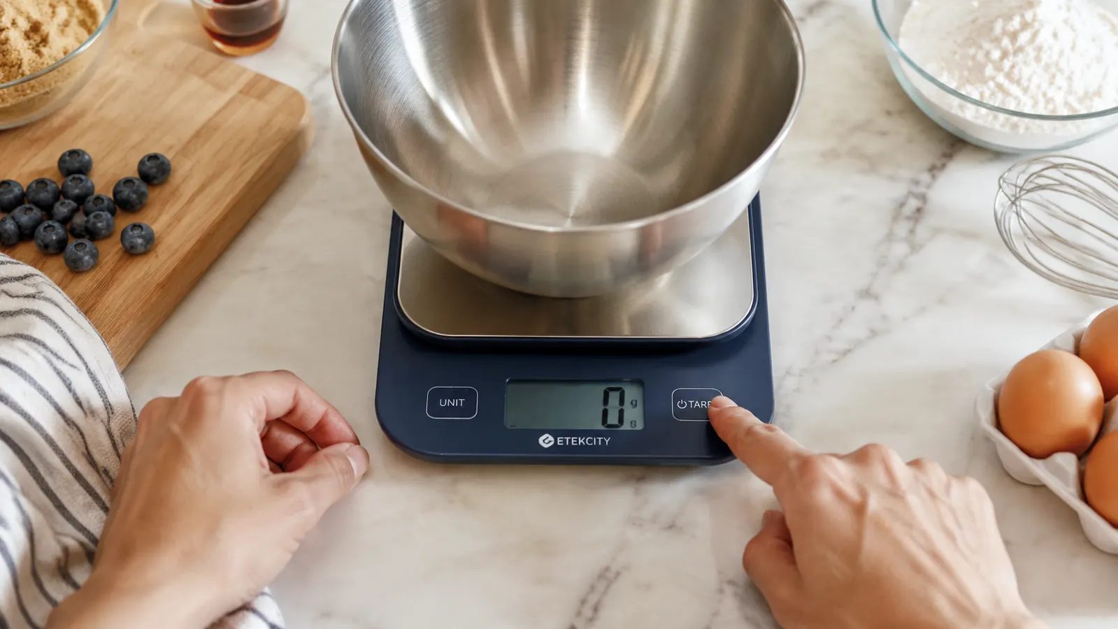 Hand placing a stainless steel mixing bowl on the Etekcity kitchen scale display showing grams