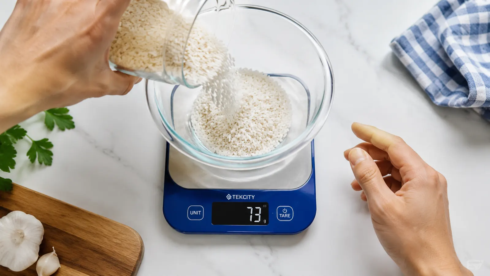 Kitchen scale with a bowl on top, ingredients being added one at a time to demonstrate tare-and-add method